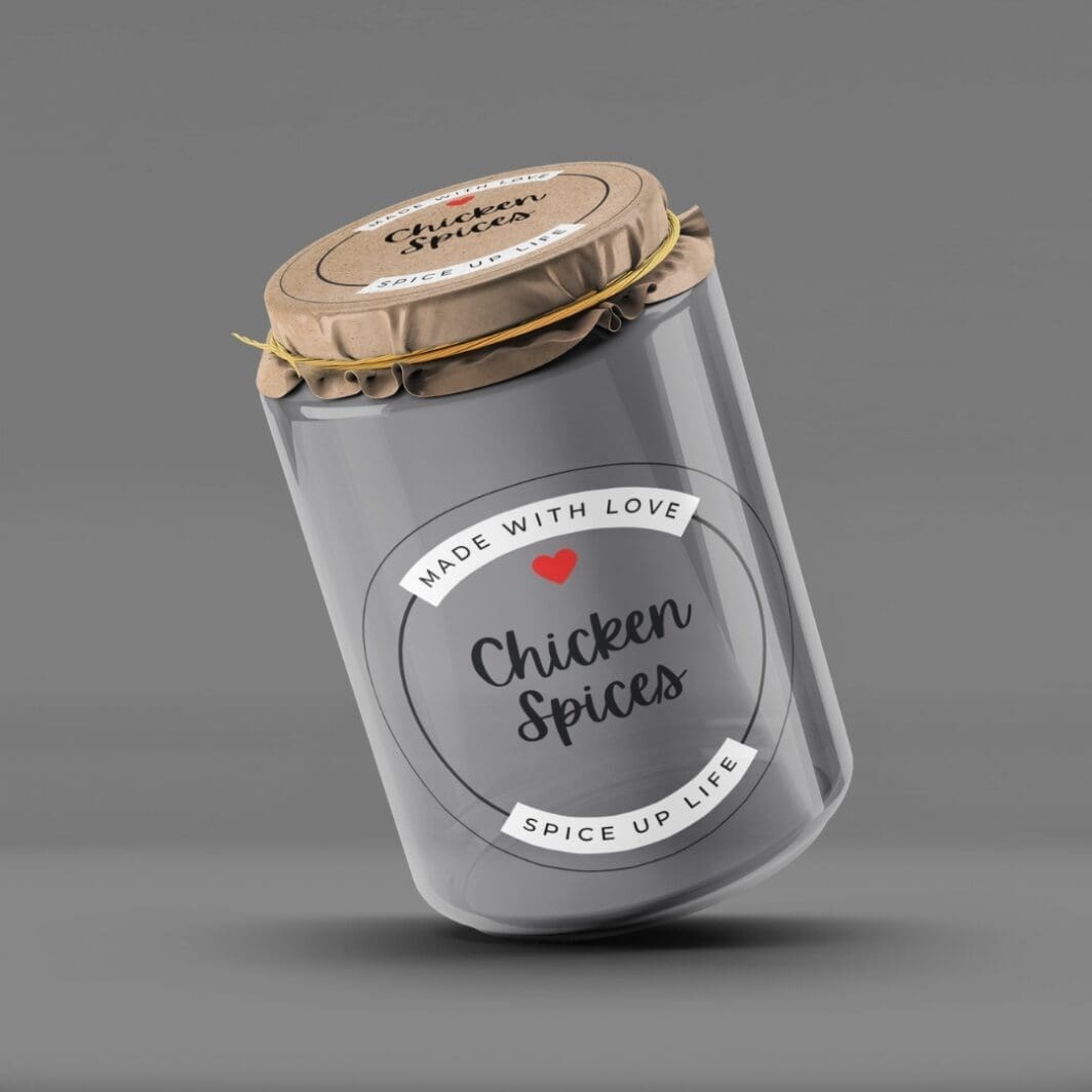 This image features a well-organized kitchen setup showcasing jars filled with spices. Jars are labeled "Black Pepper" and other 75 names of spices, peppers, and herbs, and can be places on your kitchen countertop. They are available uniquely at SharekknaOnline.com. The jars labels can be downloaded as png with transparent background, or as pdf with 8 labels per page, and can be printed at home or your local print house.