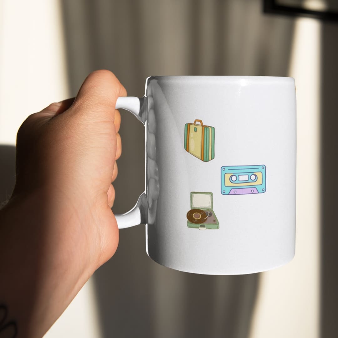 Digital sticker sheet titled Born in the 90’s featuring colorful retro illustrations, including a cassette tape, record player, guitar, scooter, vintage phones, sunglasses, Game Boy, slinky, Rubik’s Cube, old TV, camera, floppy disk, and denim pants on a beige background