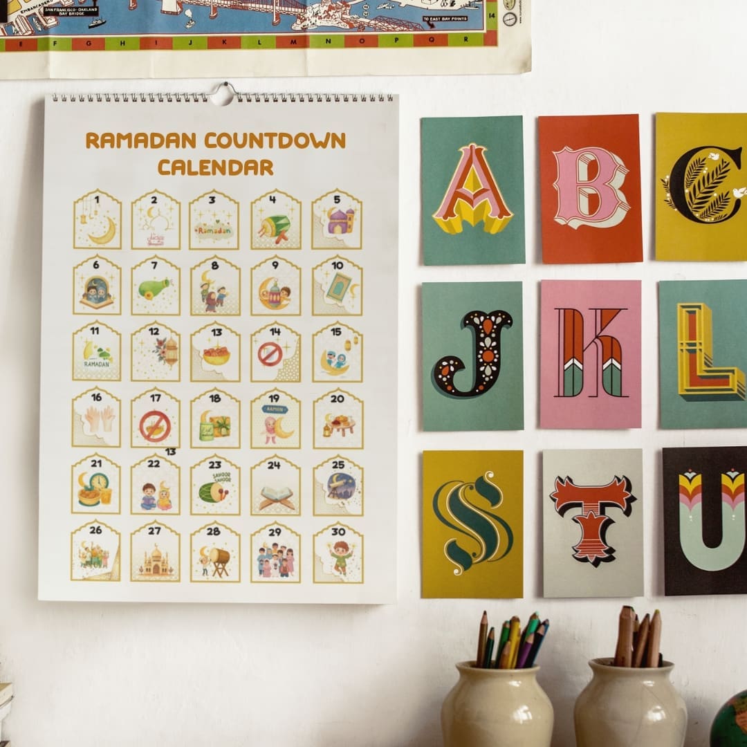 Printable Ramadan 30-day countdown calendar for kids featuring 30 numbered squares with colorful Islamic illustrations including crescent moons, lanterns, mosque, Quran, dates, drum, children praying, and Eid elements in soft pastel tones with gold borders.
