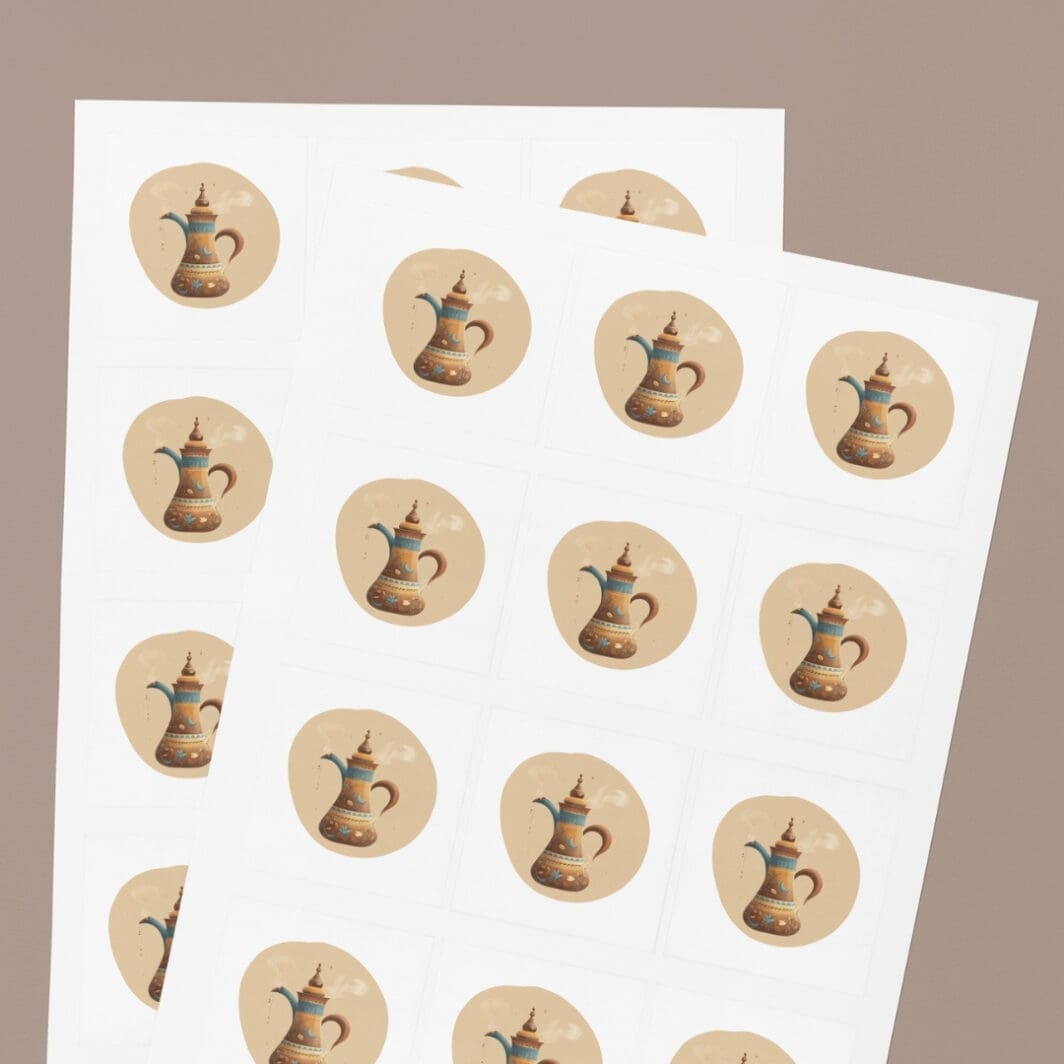 Sheet of 22 Ramadan-themed circular stickers arranged in a grid, featuring crescent moons, lanterns, mosques, camels, dates, Arabic coffee pots, and a Qur’an illustration in soft beige and blue tones on a neutral background